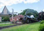 2102 passes the Tamaqua station and the Trinity United Church of Christ